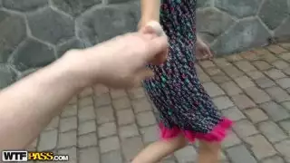 Adorable girl shows her privates in a public place at the day time