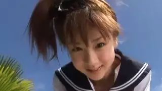 Japanese teen Aki Hoshino plays outside in the sailor outfit