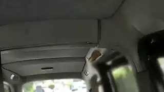 Busty blonde sucks big cock in a fake taxi